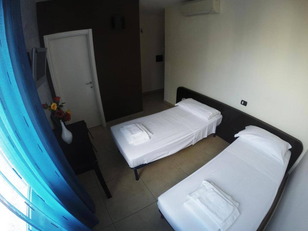 Postel nebo postele na pokoji v ubytování B&B Via Gallipoli