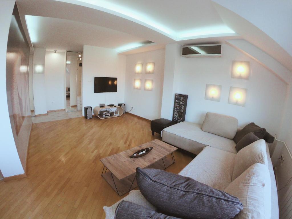 Et opholdsområde på Lavender Apartment