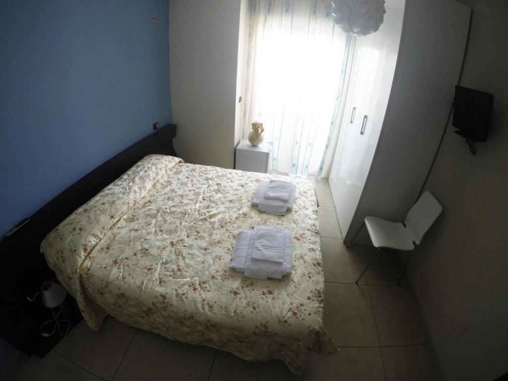 Postel nebo postele na pokoji v ubytování B&B Via Gallipoli