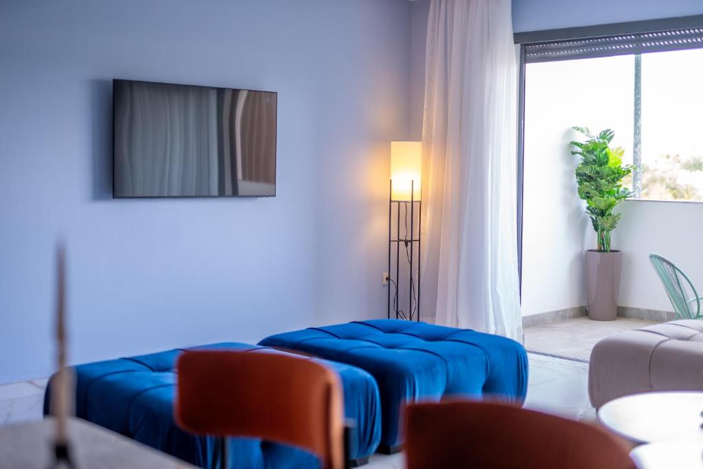 TV a/nebo společenská místnost v ubytování The lodge Residence by Goodmove - Hay Riad
