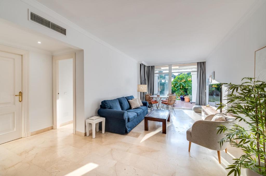 Posezení v ubytování Apartamento con piscina en 1ª línea Golf La Quinta