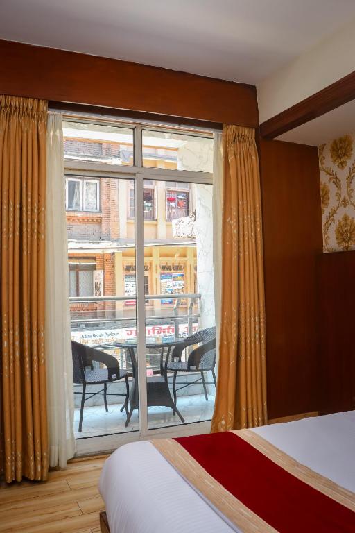Postel nebo postele na pokoji v ubytování Hotel Simal