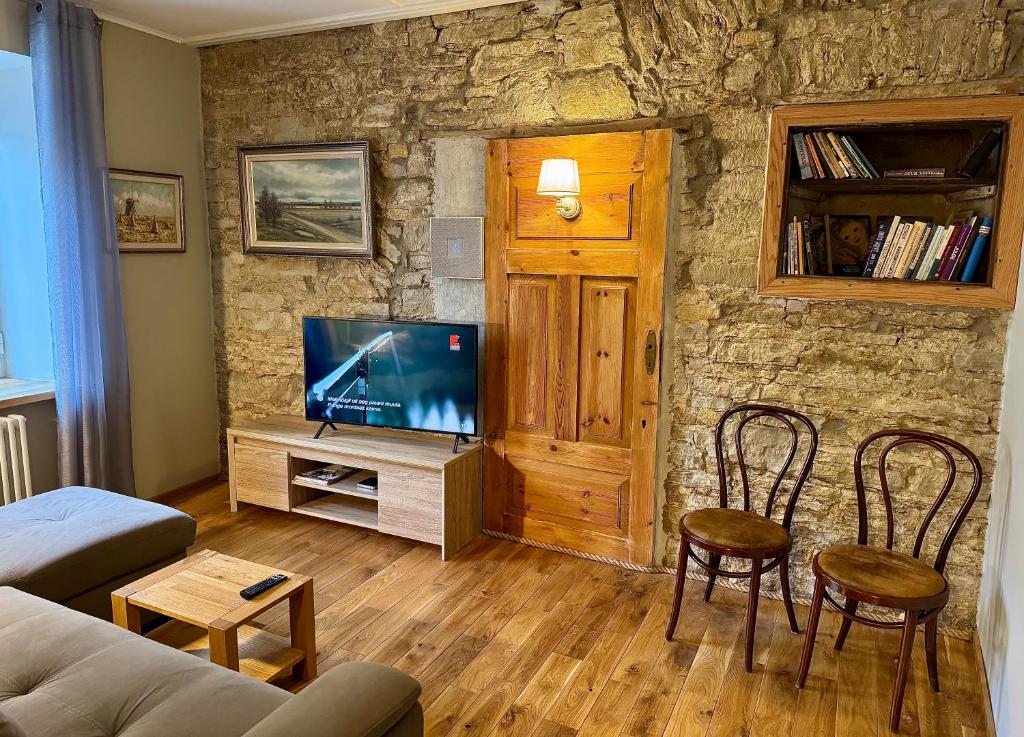 TV a/nebo společenská místnost v ubytování Kohtu Apartment Epoch