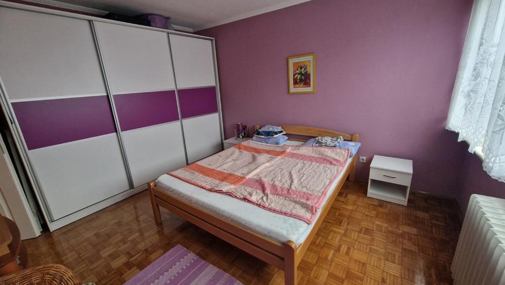 Ένα ή περισσότερα κρεβάτια σε δωμάτιο στο Apartman Marija