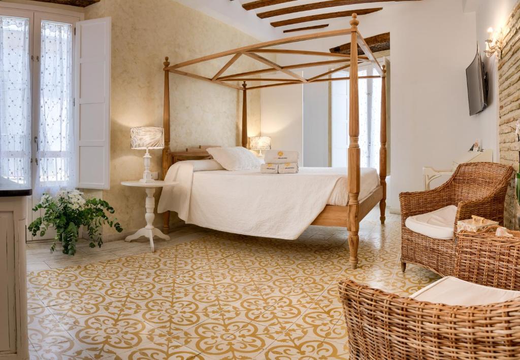 Postel nebo postele na pokoji v ubytování Hotel Argantonio