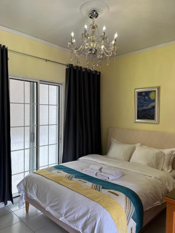 Postel nebo postele na pokoji v ubytování Qqueen House