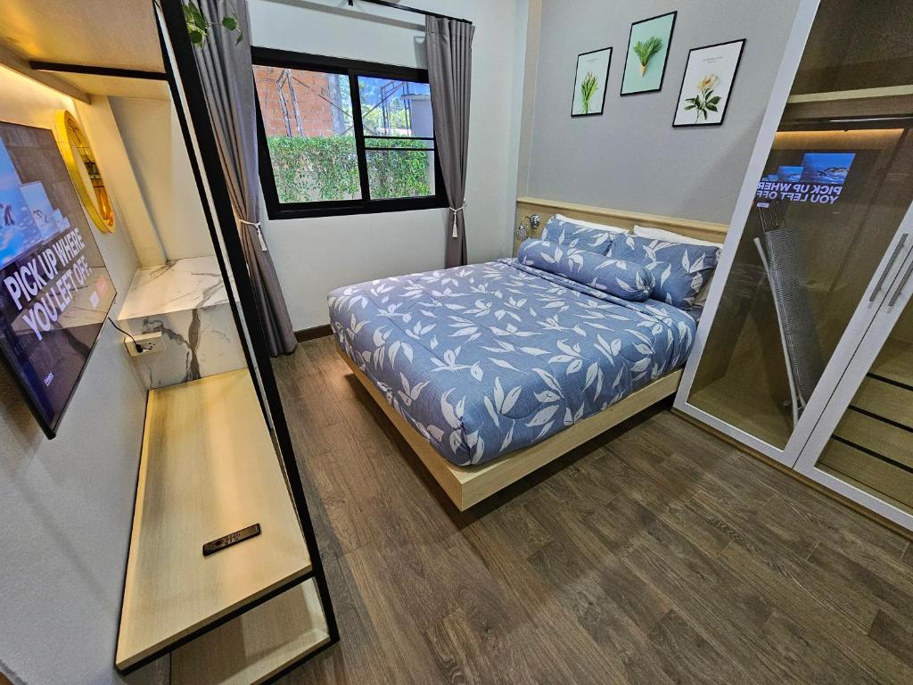 Letto o letti in una camera di Ploy Mountain View Pool Villa