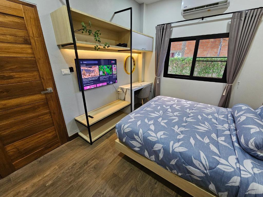 Letto o letti in una camera di Ploy Mountain View Pool Villa