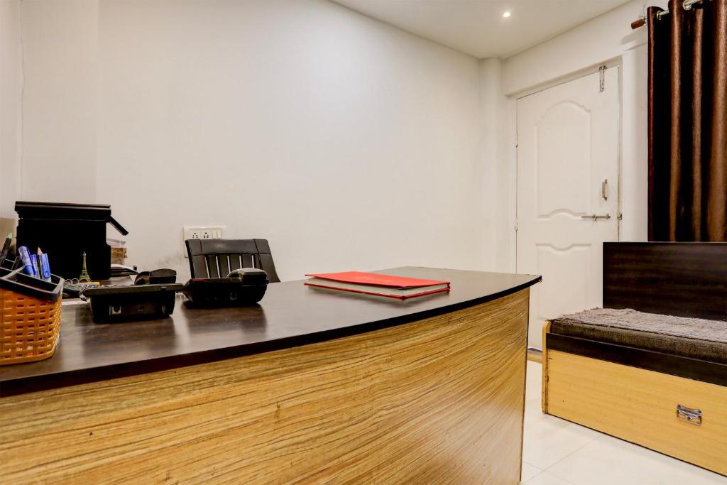 TV a/nebo společenská místnost v ubytování Hotel O GREEN PALMS
