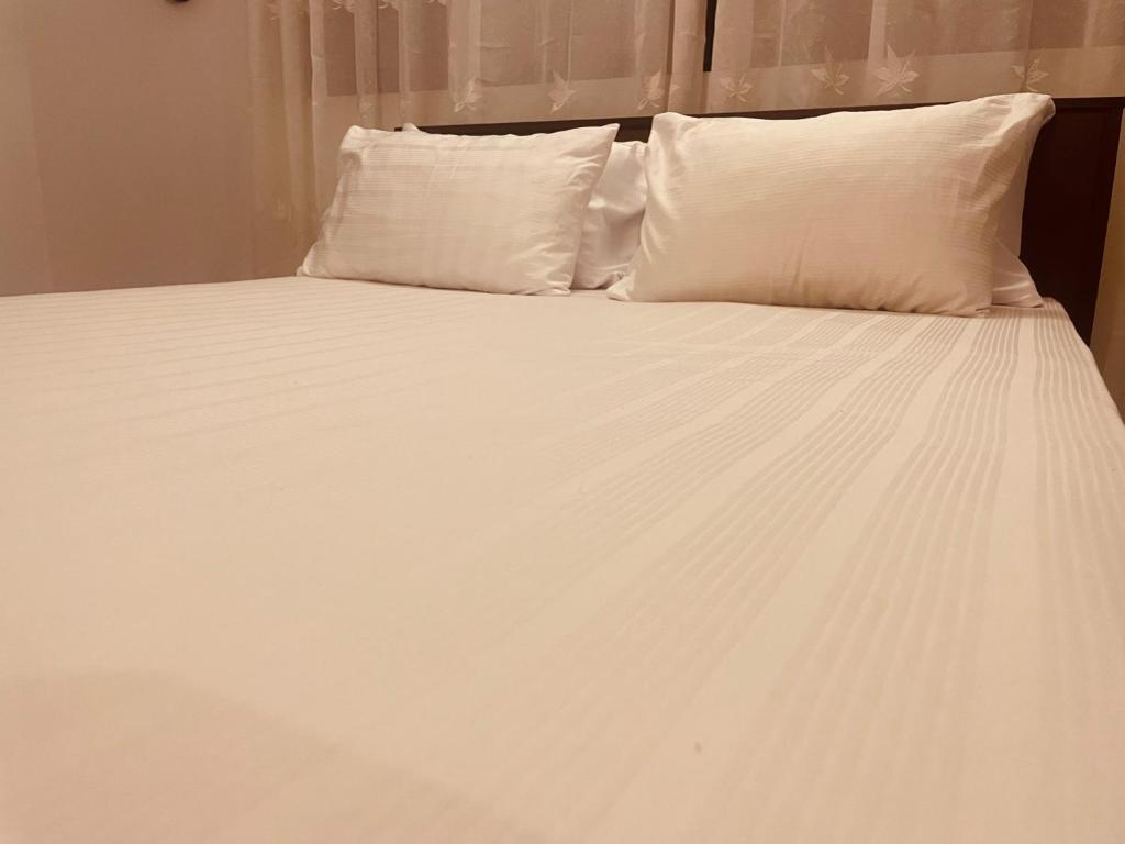 Postel nebo postele na pokoji v ubytování Mila Boutique Airport