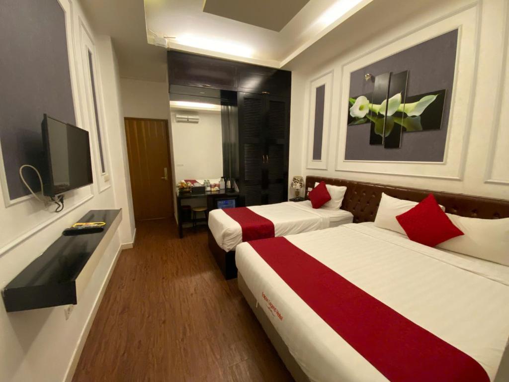 TV a/nebo společenská místnost v ubytování Eclipse Legend Hotel