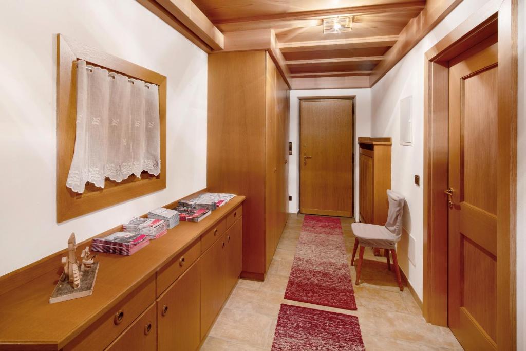 Postel nebo postele na pokoji v ubytování Guesthouse Canazei
