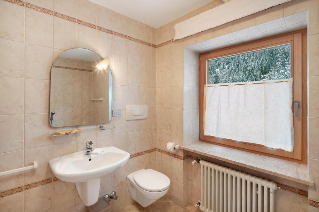 Koupelna v ubytování Guesthouse Canazei