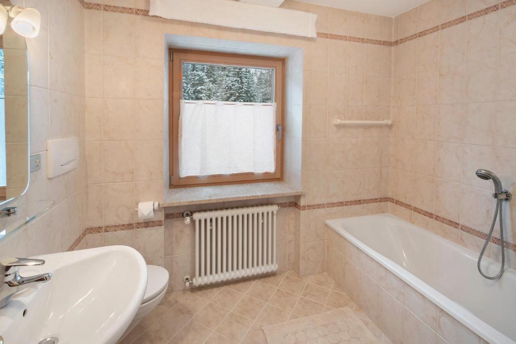 Koupelna v ubytování Guesthouse Canazei