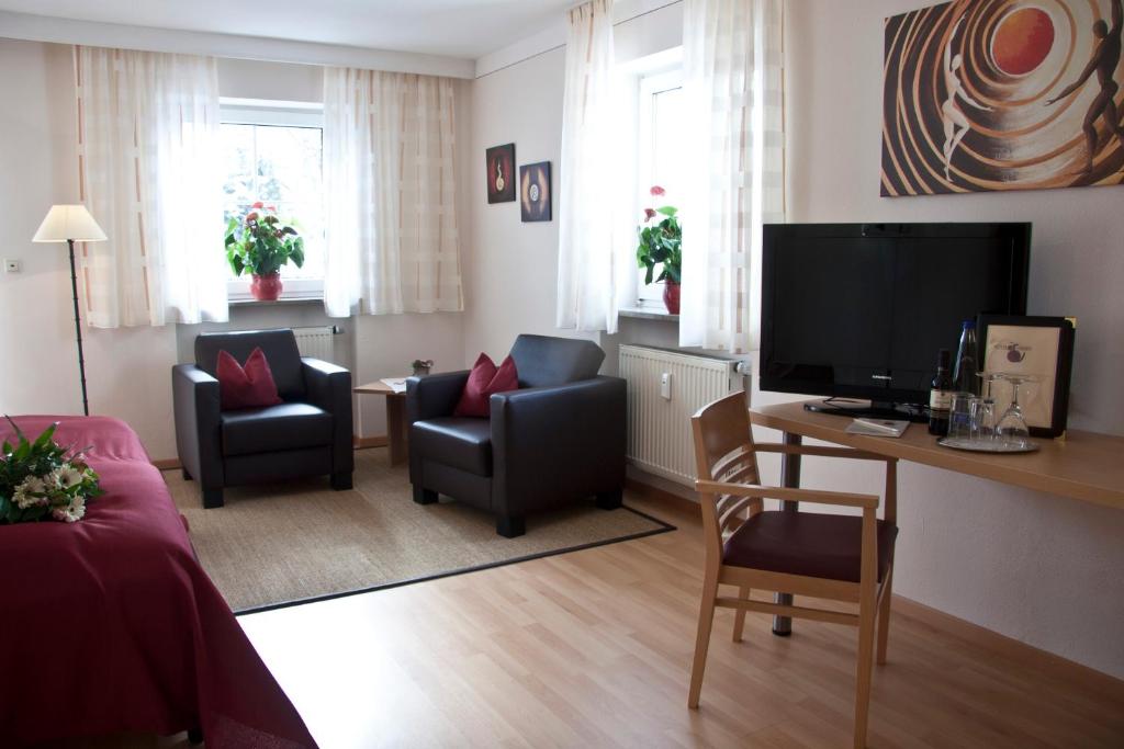 TV a/nebo společenská místnost v ubytování Hotel Linner