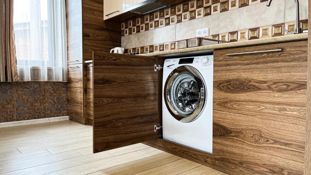 Kuchyň nebo kuchyňský kout v ubytování Dani Lux Apartments
