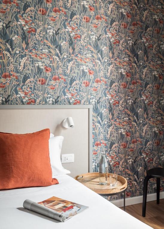Postel nebo postele na pokoji v ubytování BYPILLOW Goldoni
