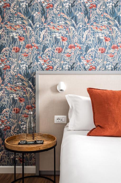 Postel nebo postele na pokoji v ubytování BYPILLOW Goldoni