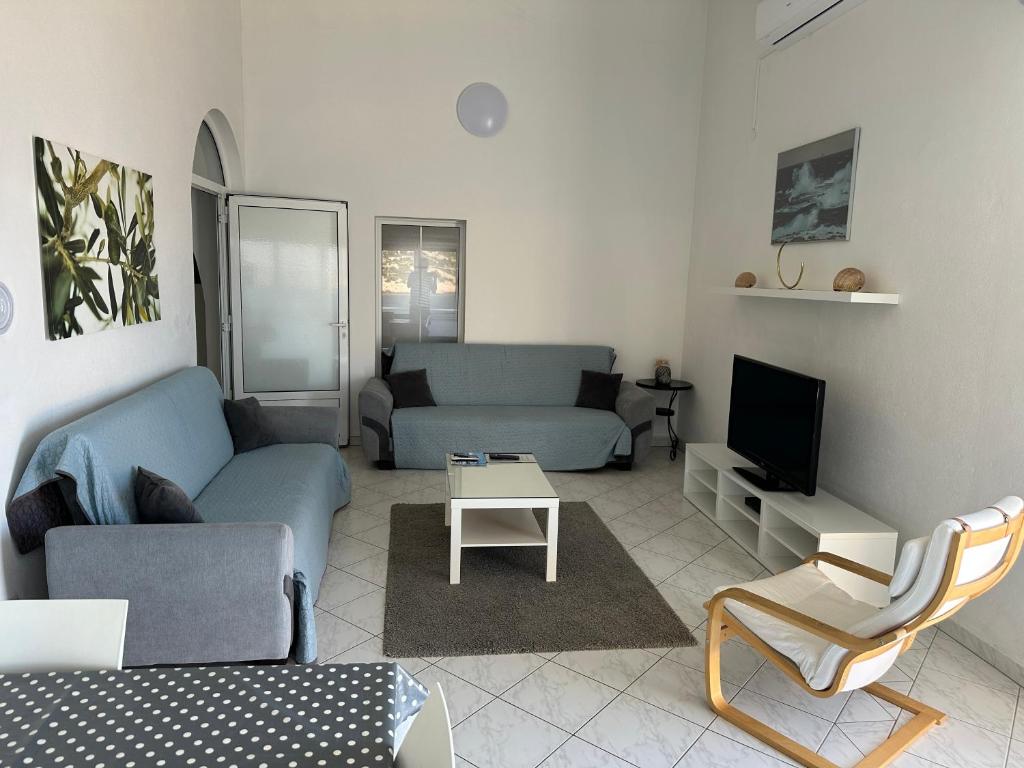 Posezení v ubytování Direkt am Meer-Apartments Puntaplanka