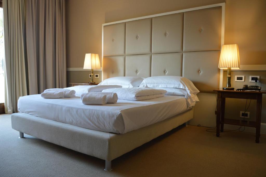 Postel nebo postele na pokoji v ubytování Blue Dream Hotel