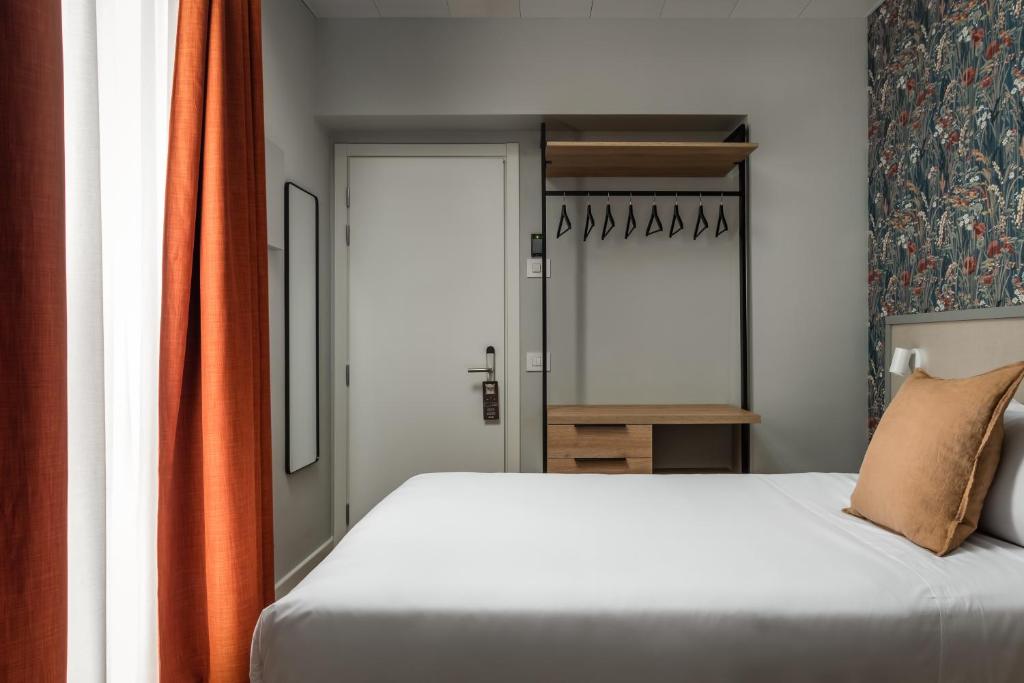 Postel nebo postele na pokoji v ubytování BYPILLOW Goldoni