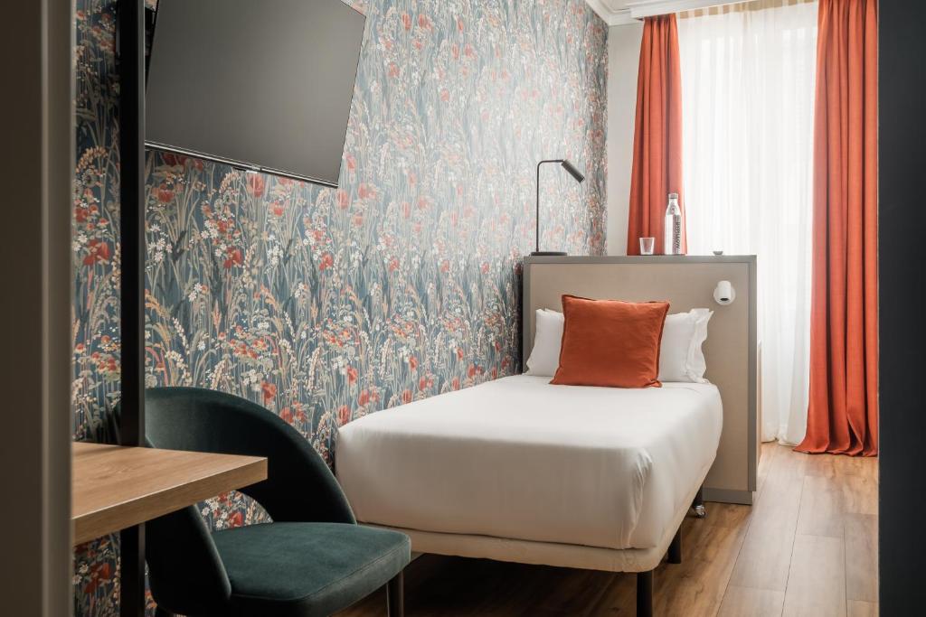 Postel nebo postele na pokoji v ubytování BYPILLOW Goldoni