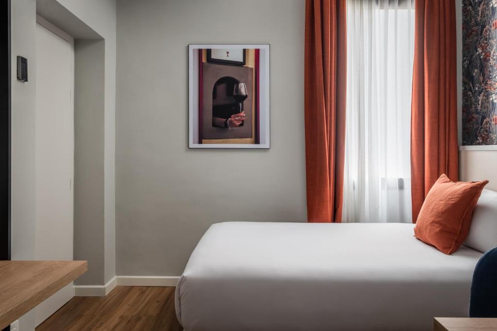 Postel nebo postele na pokoji v ubytování BYPILLOW Goldoni