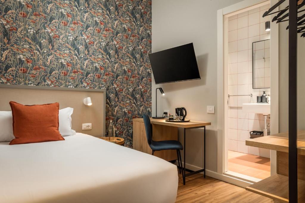 Postel nebo postele na pokoji v ubytování BYPILLOW Goldoni