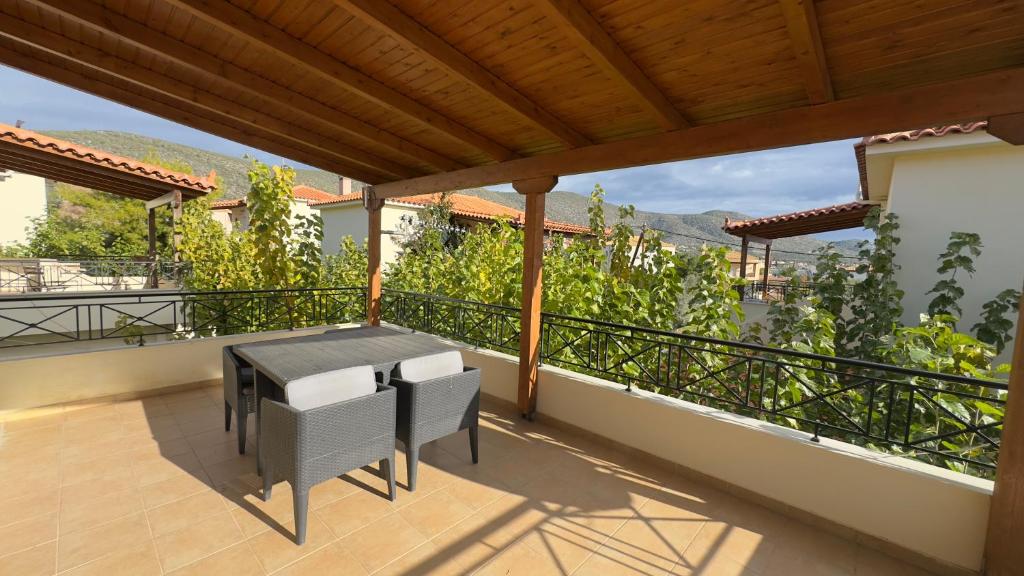 A balcony or terrace at Miramar Complex - Korfos