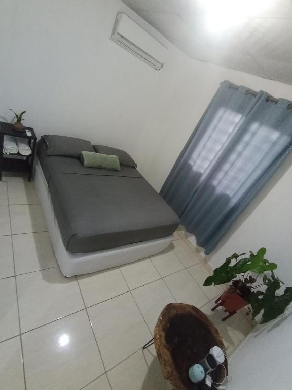 Postel nebo postele na pokoji v ubytování Copey house Chiriquí, vía hacia Volcán