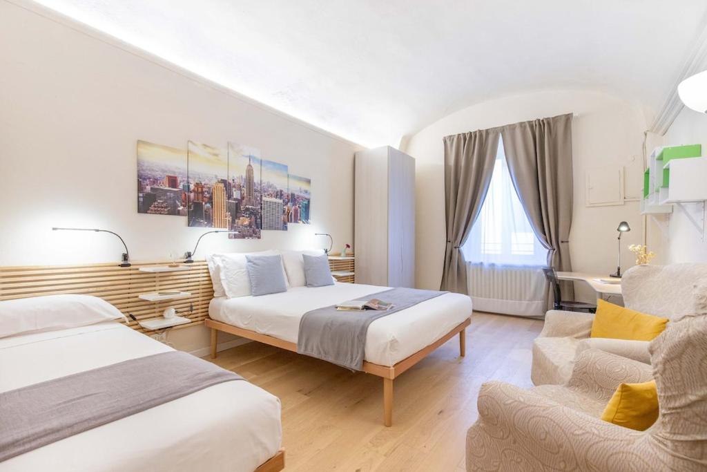 Ένα ή περισσότερα κρεβάτια σε δωμάτιο στο Casa il Mercante