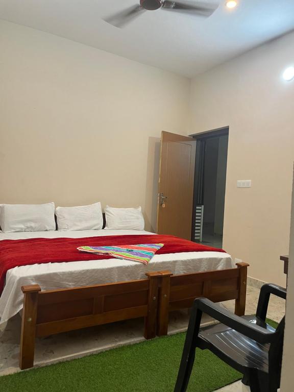 Postel nebo postele na pokoji v ubytování VARIYATH HOMESTAY THIRUNELLi