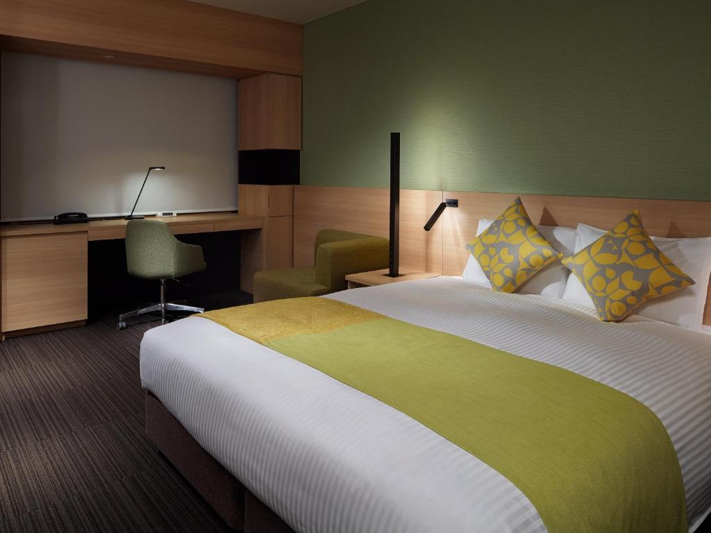 Postel nebo postele na pokoji v ubytování Mitsui Garden Hotel Kashiwa-No-Ha - Chiba