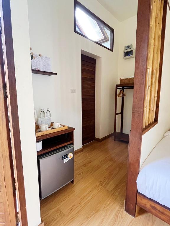 Postel nebo postele na pokoji v ubytování Pai Country Hut