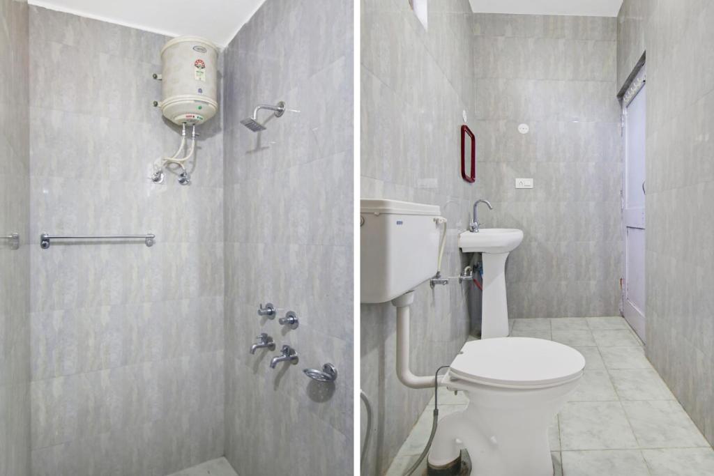 Koupelna v ubytování Hotel O Tridev