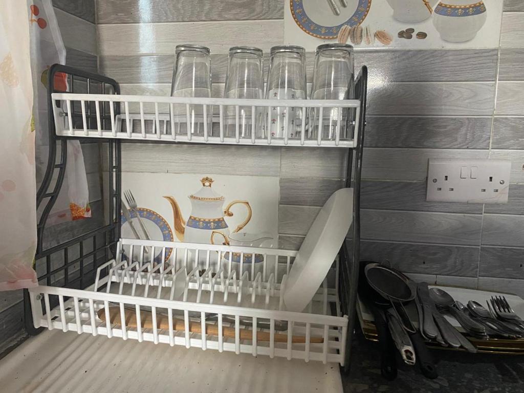 Postel nebo postele na pokoji v ubytování Kipepeo apartment