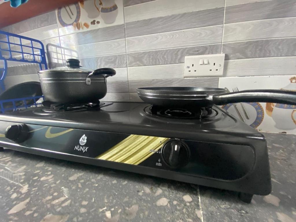 Kuchyň nebo kuchyňský kout v ubytování Kipepeo apartment