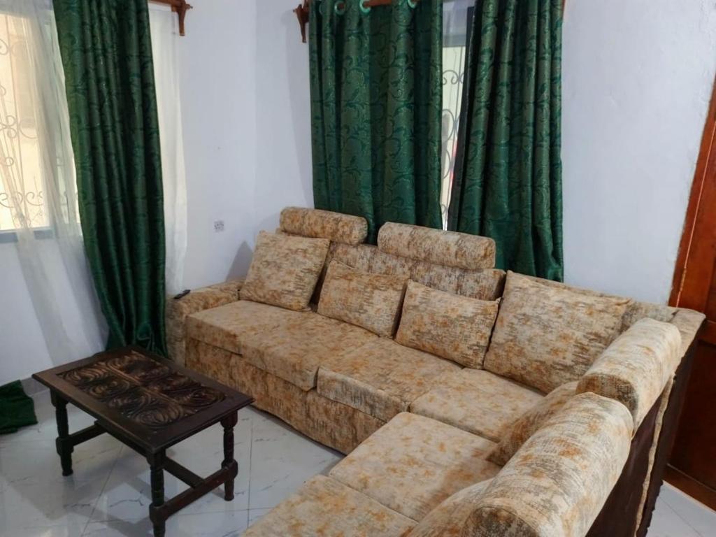 Posezení v ubytování Kipepeo apartment