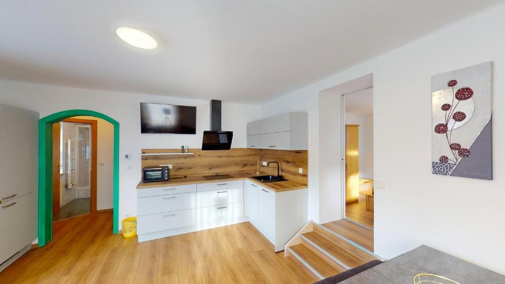 Kuchyň nebo kuchyňský kout v ubytování Bräuhaus Appartements