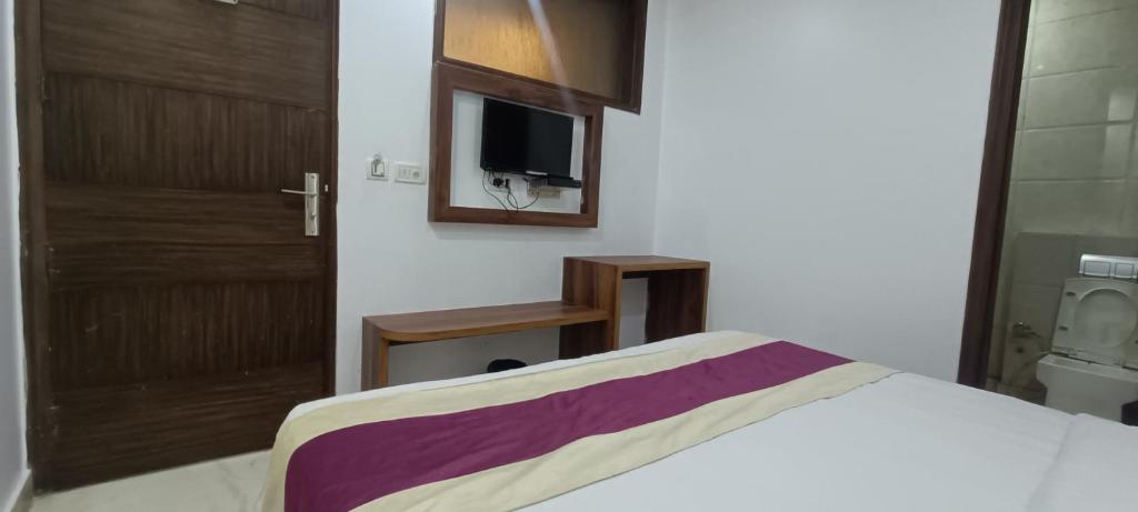 Postel nebo postele na pokoji v ubytování Hotel A10