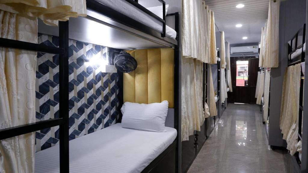 Voodi või voodid majutusasutuse Digital Dormitory toas