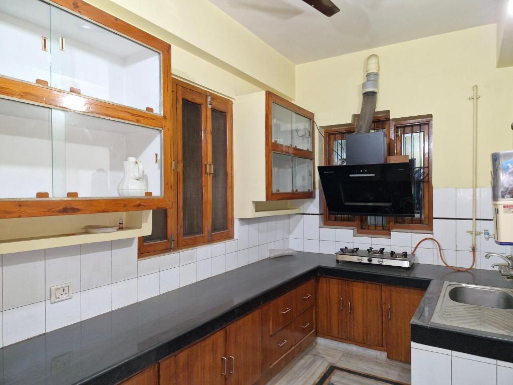 Kuchyň nebo kuchyňský kout v ubytování ReeGi Luxury Stay