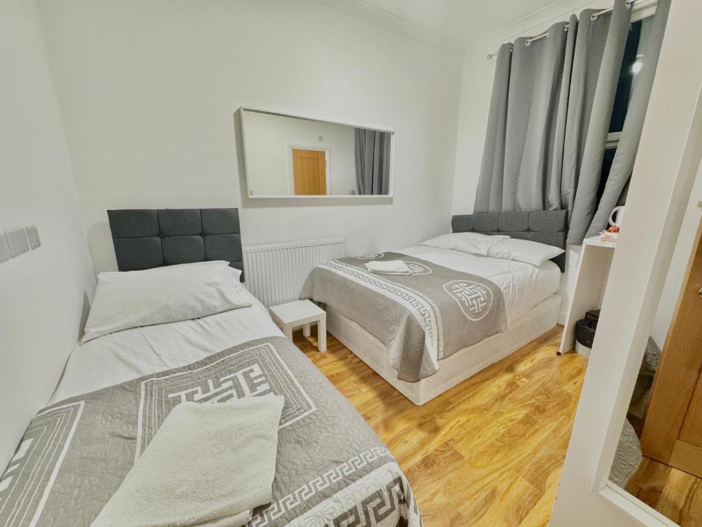 Postel nebo postele na pokoji v ubytování Venice Hotel