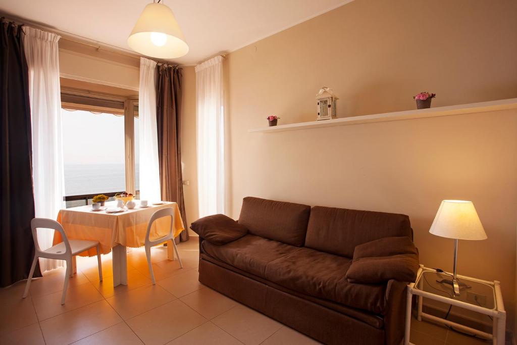 Гостиная зона в Residence Sole Mare Alaxi Hotels
