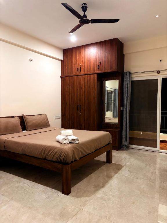 Postel nebo postele na pokoji v ubytování Ameya Coorg Home Stay
