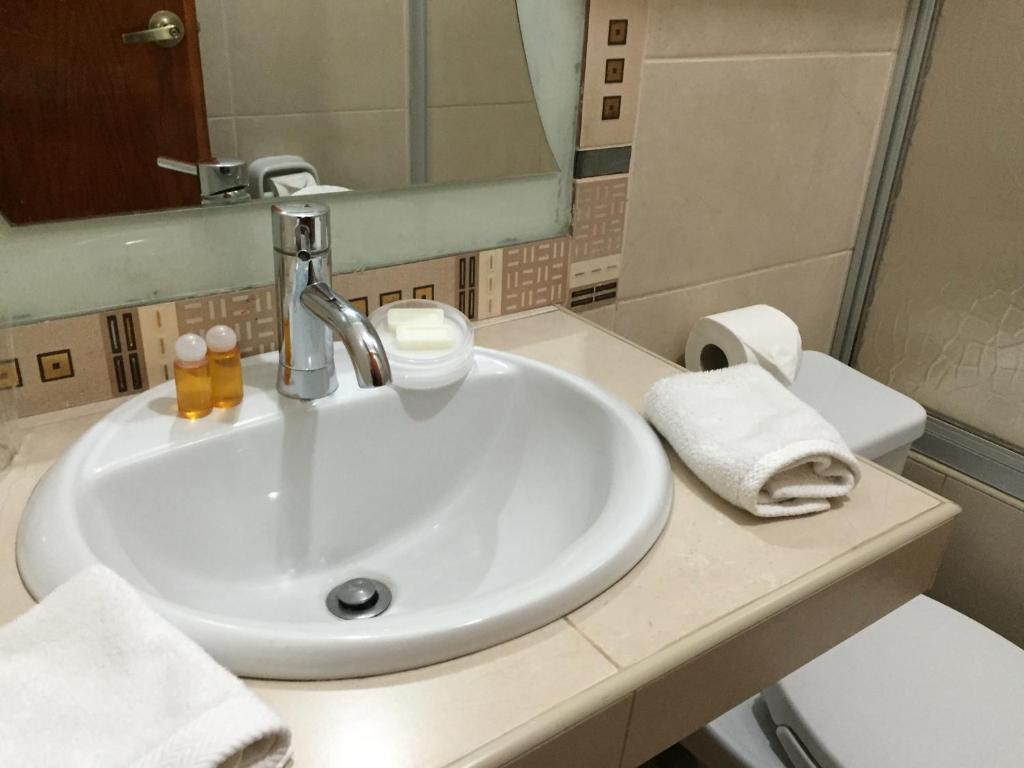 Koupelna v ubytování Kapac Inn Hotel