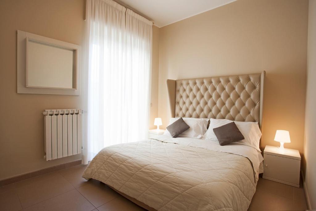 Кровать или кровати в номере Residence Sole Mare Alaxi Hotels