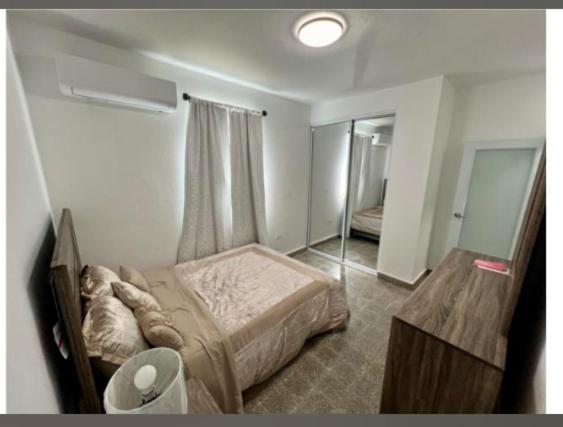 Postel nebo postele na pokoji v ubytování Relax San Juan