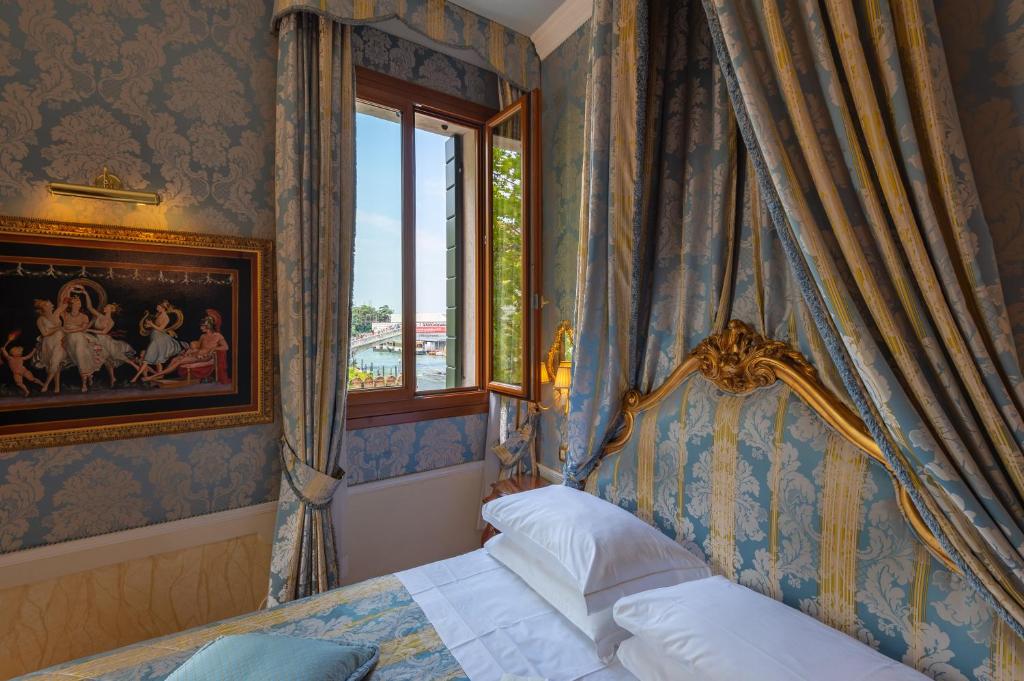 Postel nebo postele na pokoji v ubytování Canal Grande
