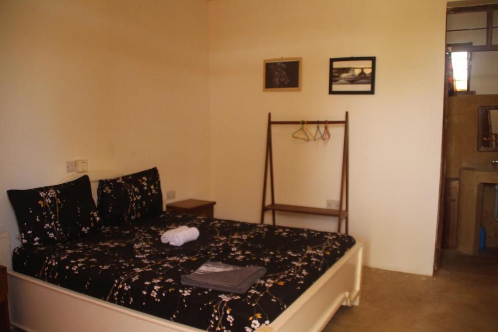 Postel nebo postele na pokoji v ubytování Raphy Home